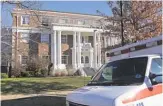  ?? TREVOR HUGHES/ USA TODAY ?? Ambulances routinely park at the Chi Psi house in Boulder, Colo. Pledge Gordie Bailey, who died of an alcohol overdose, was found in the house in 2004.