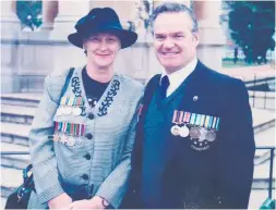  ?? Photo: Supplied ?? Local councillor Ian Uys (right) and his dearly departed wife Barbara, who proudly wore her grandfathe­r’s medals which he earned in France.