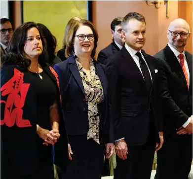  ?? THE CANADIAN PRESS/FILES ?? Jody Wilson-Raybould, left, stands with Jane Philpott at a cabinet shuffle in Rideau Hall in January. The two former ministers have now resigned from government, which struggles to stem the damage of the SNC-Lavalin scandal.