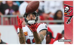  ?? ?? MIKE EVANS