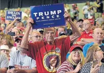  ?? [SUSAN WALSH/THE ASSOCIATED PRESS] ?? President Donald Trump received an enthusiast­ic welcome Thursday when he appeared at a rally in Huntington, W.Va. The president cited such enthusiasm for him in his tweets Monday.