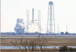  ?? STEVE HELBER AP ?? Northup Grumman's Antares rocket lifts off the launch pad at NASA'S Wallops Island flight facility in Wallops Island, Va., Saturday.