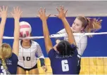  ?? GREG SORBER /JOURNAL FILE ?? Volcano Vista’s Olivia Dixson, at rear right, is one of the state’s top players. She is shown hitting against La Cueva’s Rebecca Leischner (3) and Maalese Wallace (6) last season.