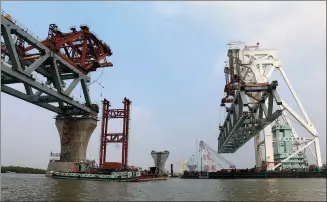  ?? XINHUA ?? The core part of the Padma Bridge over the Padma River in Bangladesh is being built by China Railway Major Bridge Engineerin­g Group Co Ltd on Feb 21.