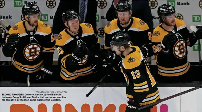  ?? STuART cAHiLL / HeRALd sTAff fiLe ?? SECOND THOUGHT: Center Charlie Coyle will slot in between Craig Smith and Taylor Hall on the second line for tonight’s preseason game against the Capitals.