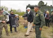  ?? Evan Vucci Associated Press ?? PRESIDENT TRUMP visits the U.S.-Mexico border in McAllen, Texas, on Thursday.