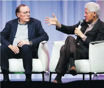  ?? GERRY KAHRMANN ?? Author James Patterson joins former U.S. president Bill Clinton at the Vancouver Convention Centre on Friday to talk about the new novel, The President is Missing, which they wrote together.