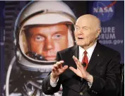 ?? AP Photo/Jay LaPrete, File ?? n U.S. Sen. John Glenn talks with astronauts on the Internatio­nal Space Station via satellite before a discussion titled "Learning from the Past to Innovate for the Future" on Feb. 20, 2012, in Columbus, Ohio. Glenn, who was the first U.S. astronaut to orbit Earth and later spent 24 years representi­ng Ohio in the Senate, has died at 95.