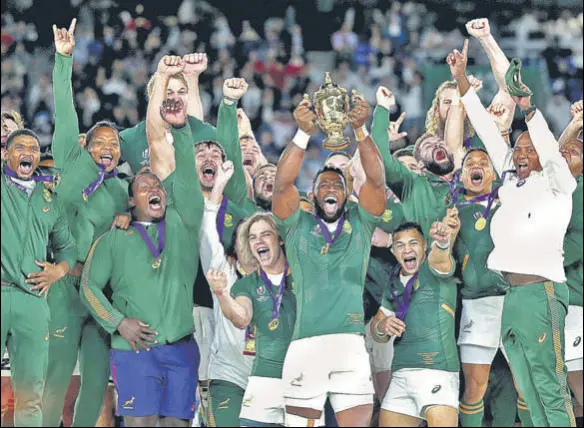  ?? GETTY ?? Siya Kolisi became South Africa’s first black captain to lift the Web Ellis Cup following the 32-12 win over England in the Rugby World Cup final at Yokohama on Saturday.