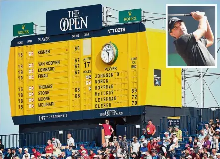  ?? — AFP ?? For all to see: The scoreboard shows US golfer Kevin Kisner (inset) still on top on day one of the 147th British Open golf championsh­ip at Carnoustie, Scotland on Thursday.