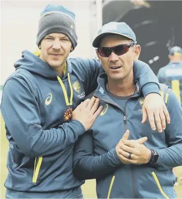  ??  ?? 0 Australia captain Tim Paine, left, and coach Justin Langer before a Test against Pakistan.