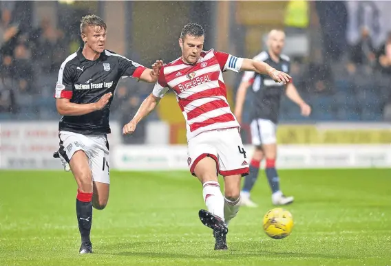  ??  ?? Mark O’Hara (left) is set to make a welcome return for Dundee today in their Developmen­t League game against St Mirren.