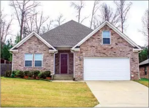  ?? LINDA GARNER-BUNCH/Arkansas Democrat-Gazette ?? Inside this Benton home are three bedrooms, two baths, an upstairs bonus room and more.