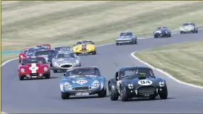  ??  ?? Wolfe and Balfe (r) topped the Gentleman Drivers contest in AC Cobra Voyazides/hadfield’s winning Lola