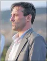  ?? CP PHOTO ?? Actor Jon Hamm is shown in a scene from “Beirut” in this undated handout photo. You can count Jon Hamm among the legions of fans of Olympic ice dance sensations Scott Moir and Tessa Virtue.