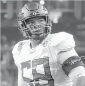  ?? RON JENKINS/AP ?? Oregon offensive lineman Penei Sewell looks on during a game against Auburn on Aug. 31, 2019.