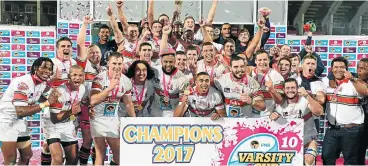  ?? /Lee Warren/Gallo Images ?? Champions: Tuks celebrate after their victory over Maties in the Varsity Cup final.