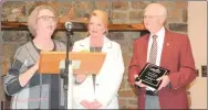  ?? Spencer Bailey/Herald-Leader ?? Siloam Springs Mayor Judy Nation presents proclamati­ons to State Representa­tive Robin Lundstrum (R-18) and retired Superinten­dent Ken Ramey at the 93rd annual Chamber Banquet on Thursday at Camp Siloam. Lundstrum won the Outstandin­g Civic Leader award and Ramey won the Pioneer Citizen award.