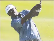  ?? Matt Sullivan / Getty Images ?? Vijay Singh plays his second shot on the first hole during the third round of the Honda Classic.