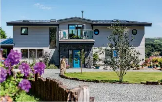  ??  ?? Main pic: This timber frame house by Scandia-hus features Cedral fibre-cement cladding – a slim, low-maintenanc­e option that can help to enable a thin overall wall profile, maximising internal space