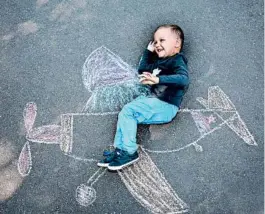  ?? DREAMSTIME ?? Pass the time with family and make neighbors’ daily walks more enjoyable with chalk art.