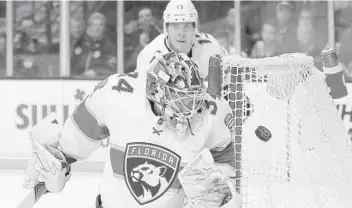  ?? MICHAEL DWYER/AP ?? Panthers goalie James Reimer blocks a shot during the second period of Saturday’s game against the Boston Bruins in Boston.