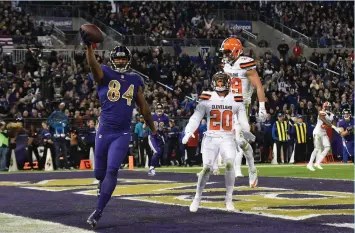  ?? (Reuters) ?? BALTIMORE RAVENS wide receiver Chris Matthews (left) celebrates after scoring a touchdown during the Ravens’ 28-7 home win on Thursday. Cleveland is 0-10 for the first time in its 66-year history. Baltimore (5-4), meanwhile, has won two straight and...