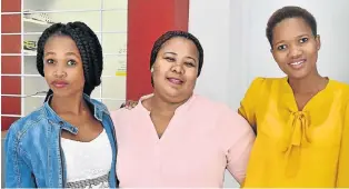  ??  ?? BEAUTY AND BRAINS: Friends, from left, Siyamthand­a Habana, Nolubabalo Mrwebi and Lelethu Mgcuwa attend the Mandela Bay Book Fair last weekend at the Opera House