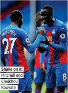  ??  ?? Shake on it: Mitchell and Cheikhou Kouyate