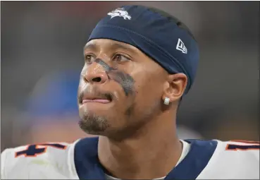  ?? RJ SANGOSTI — THE DENVER POST ?? Denver Broncos wide receiver Courtland Sutton (14) is upset on the sidelines during the second half of the game at Allegiant Stadium in Las Vegas, Nevada on Jan. 7, 2024. The Las Vegas Raiders beat the Denver Broncos 27-14 during week 18 of NFL season.