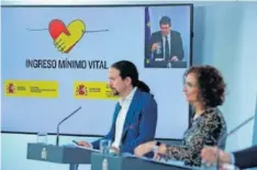  ??  ?? Pablo Iglesias y María Jesús Montero, al aprobarse el IMV.