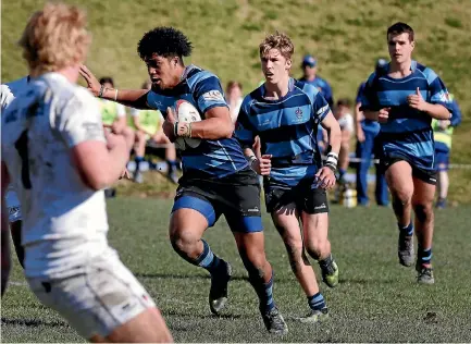  ?? MARTIN DE RUYTER/STUFF ?? Nelson College fullfback Leicester Faingaanuk­u in typical attacking mode against Timaru BHS.