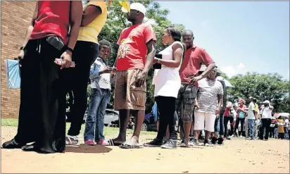  ?? PHOTO: SANDILE NDLOVU ?? Parents queue at the Johannesbu­rg district offices to register their children for the 2017 school year the day before schools reopened.