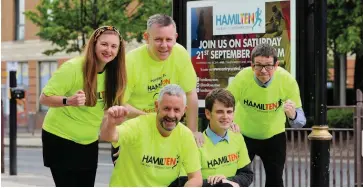  ??  ?? Good to go The Hamilton Advertiser team with Hamilton BID manager Gareth Walker (front)