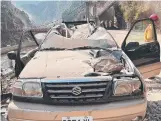  ?? ?? A car crushed by falling rocks near the coastal town of Hualien in eastern Taiwan.