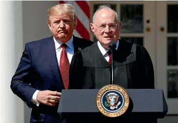  ?? AP ?? In this photo from last year, US President Donald Trump, left, and Supreme Court Justice Anthony Kennedy participat­e in a public swearingin ceremony for Justice Neil Gorsuch in the Rose Garden of the White House. The 81-year-old Kennedy says he is retiring after more than 30 years on the court.