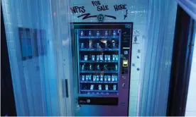  ?? Wilfred Chan/The Guardian ?? An NFT vending machine in Manhattan's Financial District allows people to buy them using credit cards instead of cryptocurr­ency. Photograph: