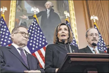  ?? J. Scott Applewhite The Associated Press ?? Speaker of the House Nancy Pelosi, D-Calif., flanked by Jerry Nadler, D-N.Y., left, and Eliot Engel, D-N.Y., has delayed naming impeachmen­t “managers.”