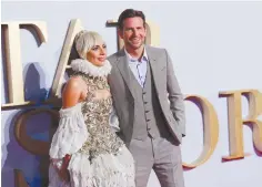  ?? REUTERS ?? LADY GAGA and Bradley Cooper attend the UK premiere of A Star is Born on Sept. 27.