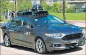  ?? Uber via Associated Press ?? SAFETY is bound to stay a central issue as robot cars are deployed. Above, a self-driving Uber is tested.