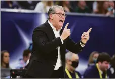  ?? Andy Lyons / Getty Images ?? UConn coach Geno Auriemma calls to his team during the NCAA Tournament championsh­ip game against South Carolina on April 3.