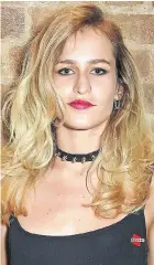  ??  ?? Model granddaugh­ter Alice Dellal