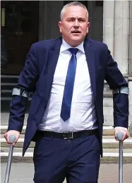  ??  ?? On crutches: Jonathon Hogg at court