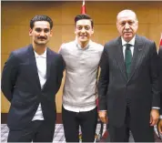  ?? — AFP ?? Turkey Presiden Recep Tayyip Erdogan ( right) poses with Ilkay Gundogan ( left) and Mesut Ozil in London.