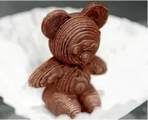  ?? PHOTO: REUTERS ?? Something new: A chocolate bear made with a 3D food printer, shown at a 2015 German trade show.