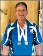  ?? SUBMITTED PHOTO ?? Shawn MacKinnon smiles with the gold and silver medals he won at the Masters Bowlers Associatio­n of Canada championsh­ips last week.