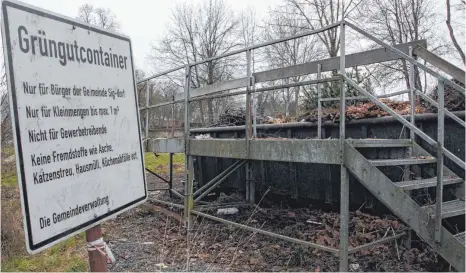  ?? FOTO: ARCHIV/CORINNA WOLBER ?? Wird von vielen im Dorf schmerzlic­h vermisst: der Grüngutcon­tainer.