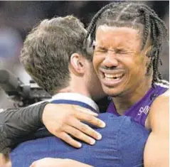  ?? AP ?? Furman guard Mike Bothwell gets emotional after first-round victory over Virginia in NCAA Tournament Thursday.