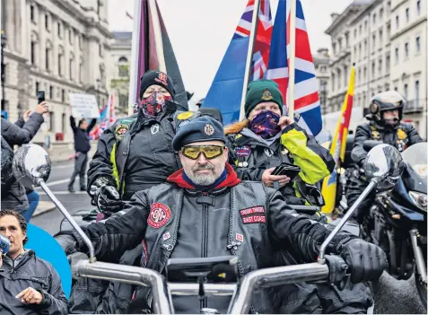  ??  ?? Army veterans in Westminste­r protest against ‘witch hunt’ prosecutio­ns of former personnel who served in Northern Ireland during the Troubles