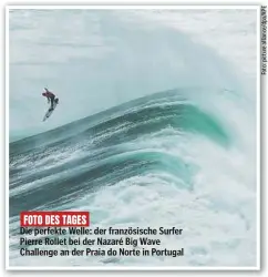  ?? ?? FOTO DES TAGES
Die perfekte Welle: der französisc­he Surfer Pierre Rollet bei der Nazaré Big Wave Challenge an der Praia do Norte in Portugal